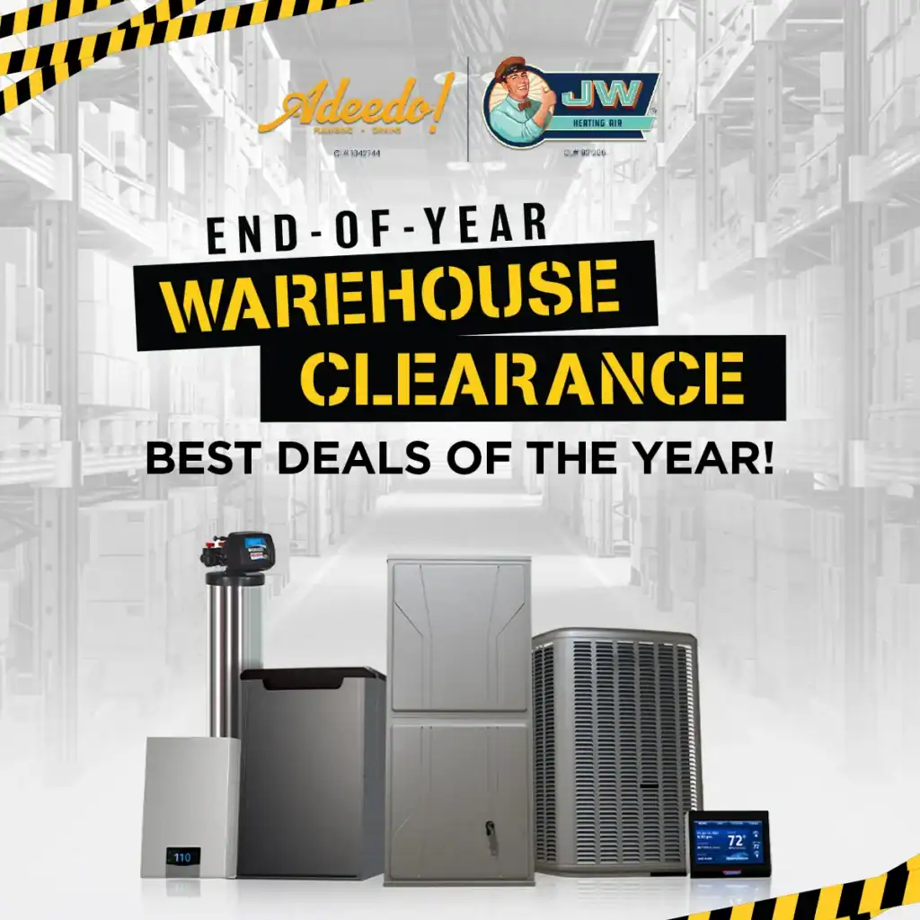 End Of Year Warehouse Clearance | Jw Heating &Amp; Air Four Hvac Units And A Thermostat Are Displayed In Front Of Warehouse Shelves, Advertising An End-Of-Year Warehouse Clearance Sale With Best Deals Of The Year.